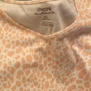 Peach and cream color. Never worn.